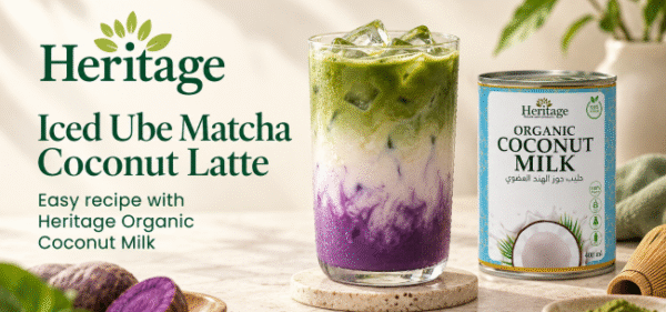Iced Ube Matcha Coconut Latte with purple ube, creamy coconut milk and green matcha layers beside Heritage Organic Coconut Milk